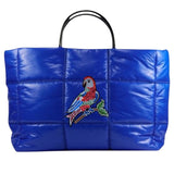 Papegaai Paillette Strijk Embleem Patch op een blauwe schoudertas