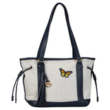 Vlinder Strijk Embleem Patch Oranje Geel Zwart op een canvas tas