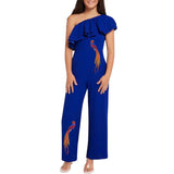 Rood Gele Paillette Paradijs Vogel XXL Strijk Embleem Patch 2 samen met de rechter variant op een blauwe jumpsuit