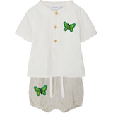 Twee maal de Vlinder Strijk Applicatie Embleem Patch Groen op een pakje voor een peuter