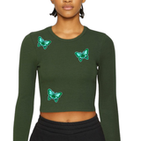 Drie maal de Vlinder Strijk Embleem Patch Groen op een een groene longsleeve