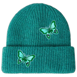 Twee maal de Vlinder Strijk Embleem Patch Groen op een groene muts
