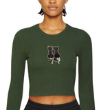 Poes Kat Reversible Paillette Strijk Embleem Patch Zwart Zilver op een groene longsleeve