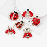 Vlieg Insect Strass Broche Sierspeld samen met vijf andere broches uit dezelfde serie