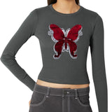 Vlinder Op Naai Embleem Patch Reversible Paillette Zilver Rood op een groen grijze longsleeve