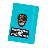 Sugar Skull Doodskop Strijk Embleem Patch Zwart de voorzijde van een blauwe agenda samen met een tekst strijk patch