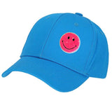Smiley Strijkpatch Shimmer Pailletten Opstrijkbaar op een blauwe cap