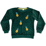 Vijf maal de Ananas Paillette Strijk Embleem Patch op een groene sweater