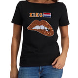 King Koningsdag Strijk Patch Set op een zwart t-shirt