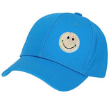 Smiley Strijk Patch Sequin Iron On op een blauwe cap