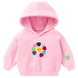 Hartje Strijk Embleem Patch Applicatie Mint Groen Medium samen met de 10 andere kleurvarianten op een kleine roze hoodie