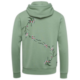 Bloesem Bloemen Tak Strijk Embleem Patch Wit Oranje Groen twee maal op de rugzijde van een groene hoodie