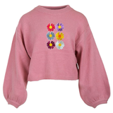 Madelief Margriet Bloemen Strijk Embleem Patch Set 6 stuks op een roze sweater