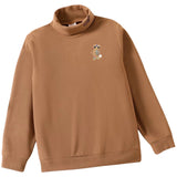 Uil Oehoe Sierspeld Broche op een beige sweater