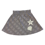 Zilverkleurige Smiley Glitter Ster Strijk Embleem Patch samen met een glitter diamant strijk patch op een rokje