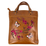 Luxe Vlinders Roze Bloesem Strijk Embleem Patch Set op een bruine tas