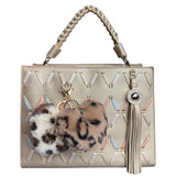 Sleutelhanger Pluche Hart Luipaard Print Tas Hanger Beige Bruin samen met de crème beige variant aan een handtas 