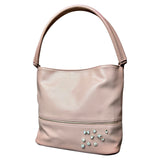 Pin Broche Set Wit Champagne Roze 10 stuks op een roze tas