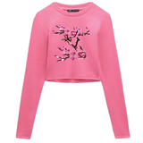 Twee takken van de Magnolia Bloesem tak Opnaai Embleem Patch Set op een roze longsleeve