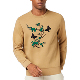 Bloesem Bloemen Vlinder Strijk Embleem Patch Set Groen op een mosterdgele sweater