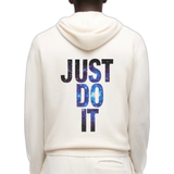 Just Do It Tekst Strijk Applicatie op de rugzijde van een ecru kleurige hoodie