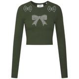 De grote en de twee kleine strikjes van de Strik Strikken Bow Strass Strijk Applicatie op een groene longsleeve