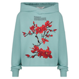 Magnolia Bloesem Bloemen Tak XXL Strijk Embleem Patch Rood op een blauw / groene hoodie